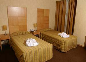Standard double with city view, private facilities (shower), and breakfast